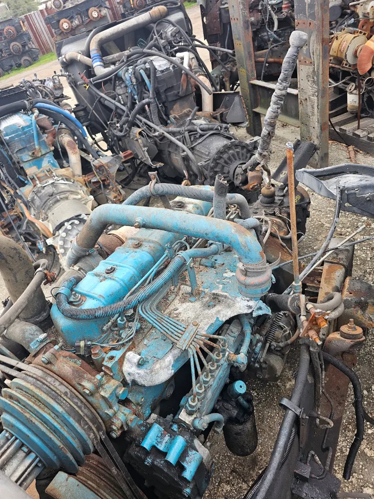Used industrial diesel engines on display at salvage yard